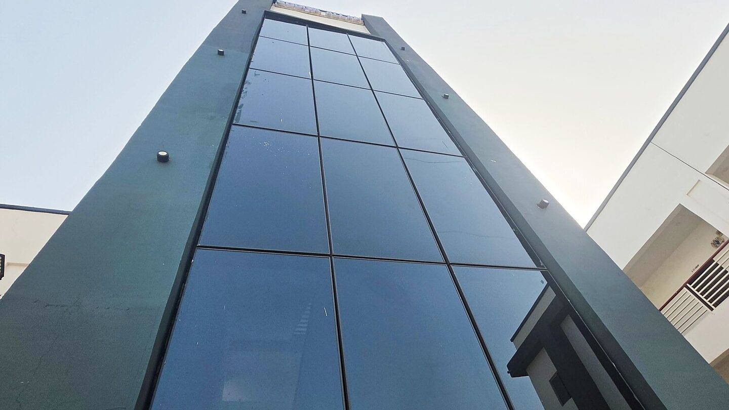 The glass front of our campus building in Sokoto